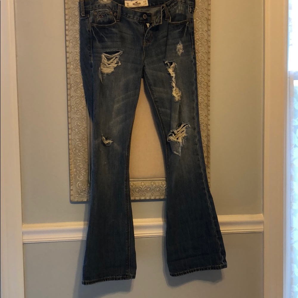 Ripped bell bottom jeans